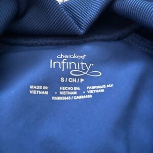 Cherokee Classic Blue Scrub Pants and scrub jacket set both size small.